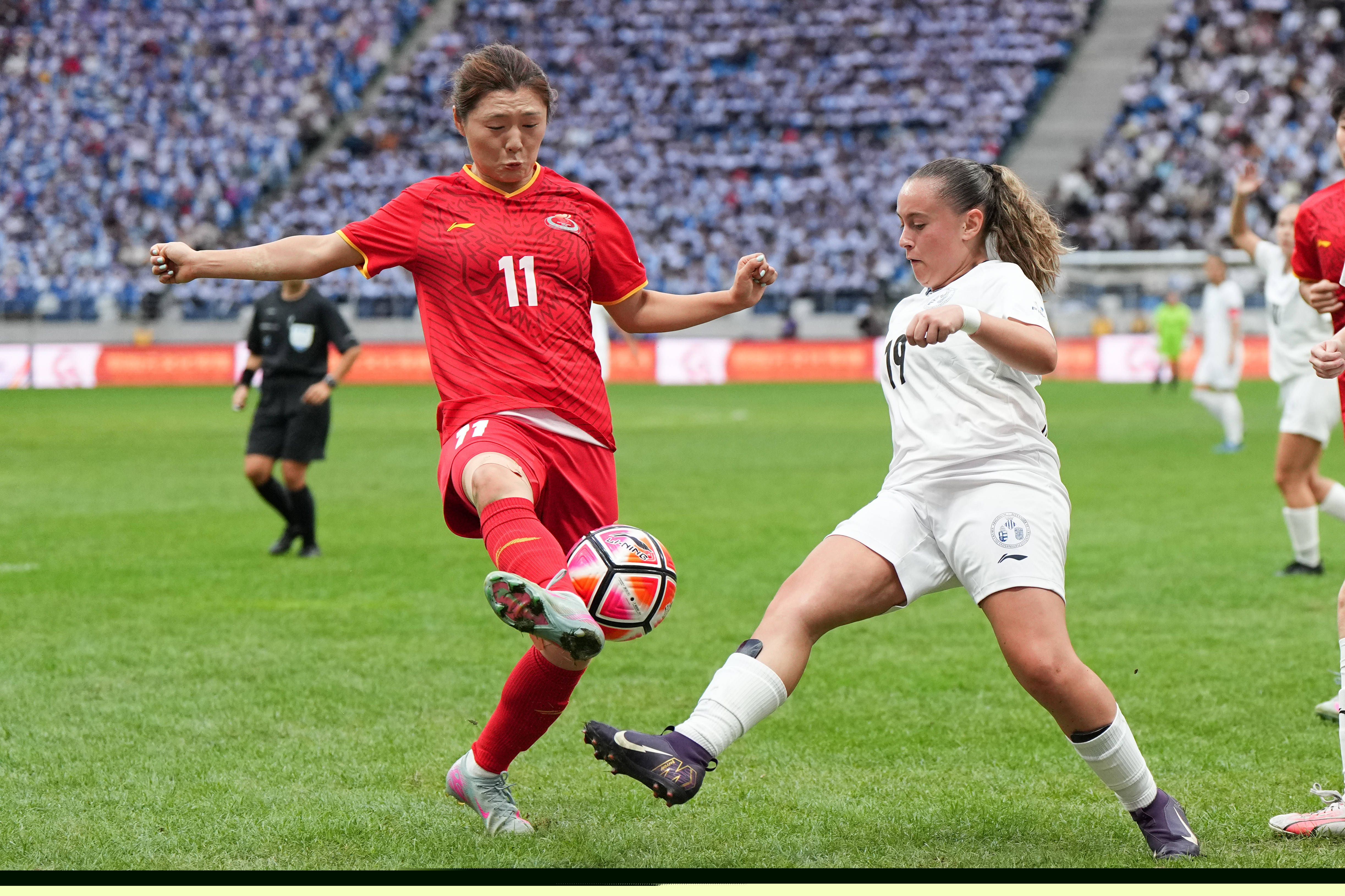 (体育)足球——国际大体联足球世界杯揭幕战:上海体育大学女队胜瓦伦西亚大学女队